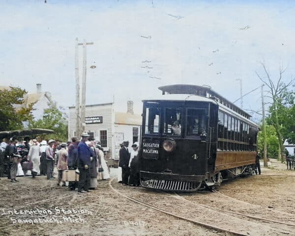 Interurban train picks up passengers in Saugatuck